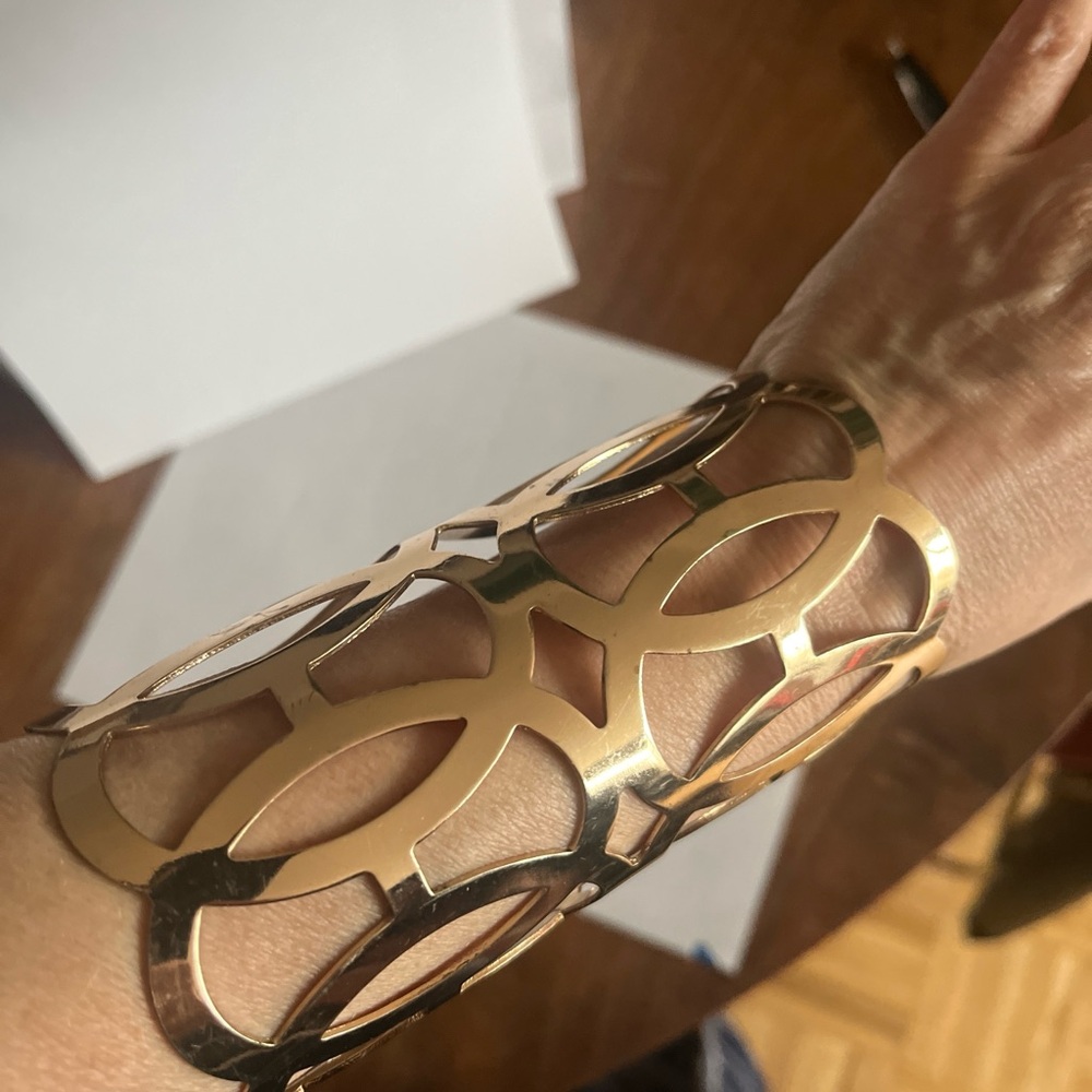 Gold adjustable statement bracelet. 5 inch long . New